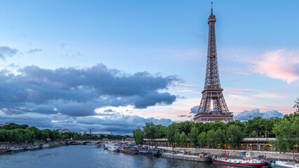 The Eiffel Tower day to night Timelapse with boat station. Paris, France