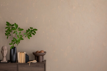 An elegant interior featuring earthy tones, modern art, and simple decor. A harmonious blend of natural and contemporary elements for a chic living space.