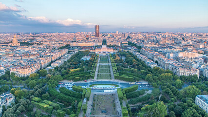 Aerial view of a large city skyline at sunset timelapse. Top view from the Eiffel tower. Paris,...