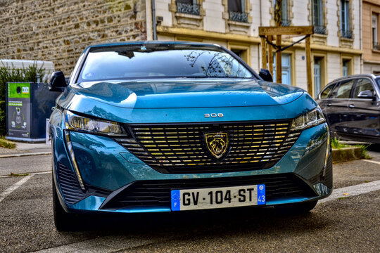 Saint-Etienne, France - September 1st 2024 : Blue Peugeot 308 III (since 2021) parked in a street. It's, at the choice of the customer, a petrol, diesel, electric car or a hybrid one.