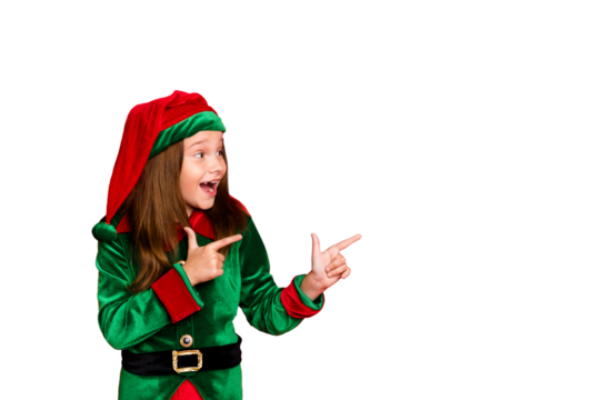 Profile side photo of surprised elf in hat cap showing ads with her index finger see miracle wearing costume isolated over red background
