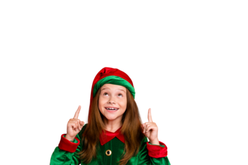 Portrait of cute elf in green hat cap having long haircut showing ads with her index finger see miracle smiling wearing costume isolated over red background
