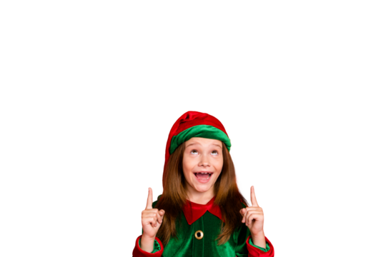 Portrait of impressed elf child in hat cap screaming wow omg showing adverts with her index finger isolated over red background