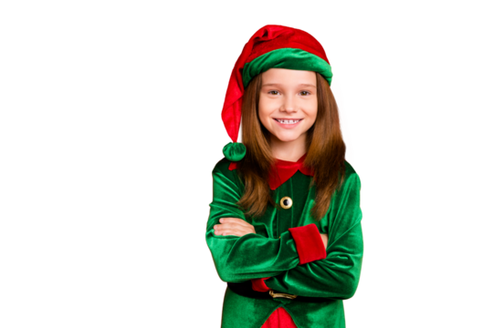 Portrait of cheerful elf girl in hat with her hands crossed smiling ready to help in christmas night wearing cap costume isolated over red background - Powered by Adobe