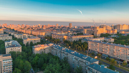 Obraz premium Moscow city bathed in yellow sun at dawn timelapse. An early foggy morning. Shadows moving on houses.