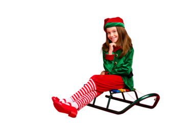 Portrait of her she nice attractive charming cheerful cheery funny sweet pre-teen elf santa claus apparel look outfit sitting on sled isolated over bright vivid shine red background