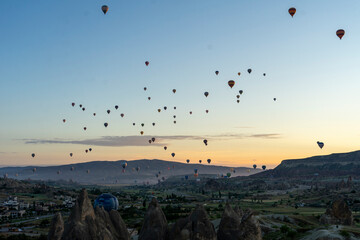 Hot air balloons rising early in the morning