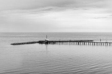 Obraz premium Bridge build Over the sea, White rock, BC, Canada. Old wooden suspension bridge in White Rock, South Surrey,