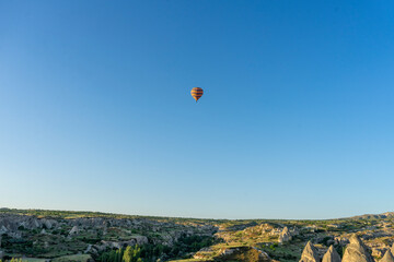 Hot air balloons rising early in the morning