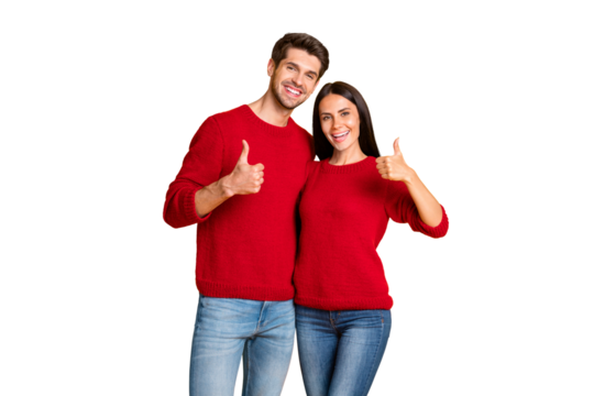 Portrait of lovely spouses show thumb up recommend ads wear red jumper denim jeans isolated over yellow background