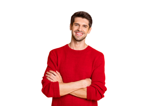 Portrait of charming man with his hands crossed wear red jumper isolated over yellow background