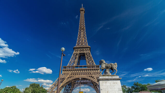 Eiffel Tower from bridge over Siene river in Paris timelapse hyperlapse, France