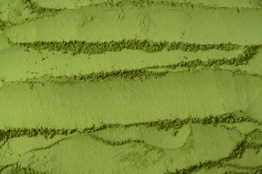 Matcha tea, matcha powder as a background.