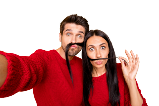 Close up photo of charming lady and her guy take selfie fool with lips pouted plump wear red jumper isolated over yellow background - Powered by Adobe
