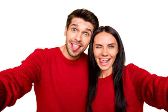 Close up photo of cheerful spouses grimace take self portrait wear red sweater isolated over yellow background