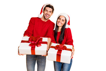 Portrait of two lovely people spouses give present for new year enjoy wear red pullover denim jeans...
