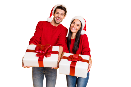 Portrait of two lovely people spouses give present for new year enjoy wear red pullover denim jeans isolated over yellow background
