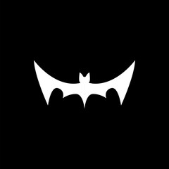 vector halloween white bat animal icon, logo and sign isolated on balck background. vector bat silhouette with wings. vector abstract bat tattoo art concept design template