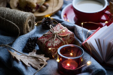  cup of coffee, gift and candles
