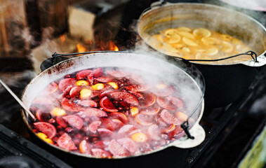 Hot mulled wine on a street food market