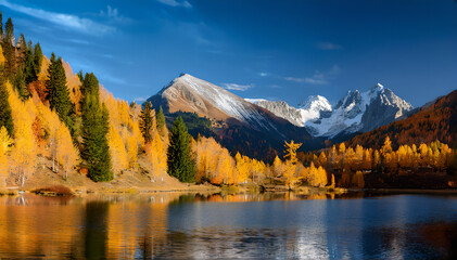 Obraz premium Tranquil Autumn Mountain Panorama with Vibrant Foliage and Serene Lake