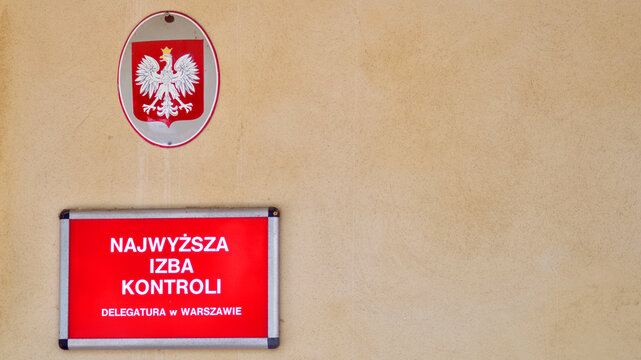 Warsaw, Poland. 25 August 2024. Seat of the Supreme Audit Office. Nameplate on the building NIK.