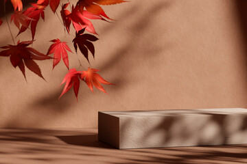 Natural stone podium with falling autumn leaves in front of beige background. Fall season,...