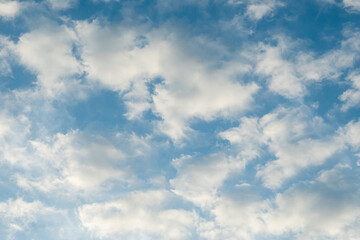 Cirrus clouds in the blue sky.