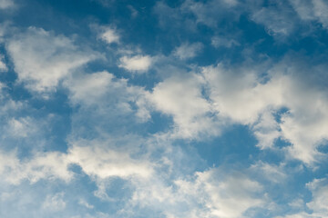 Cirrus clouds in the blue sky.