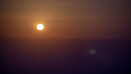 Fototapeta premium Abu Dhabi city skyline with skyscrapers at sunrise from above timelapse