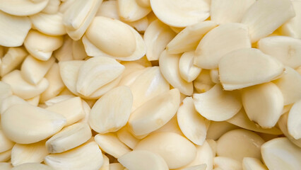 Sliced ​​garlic for background. Indian food.