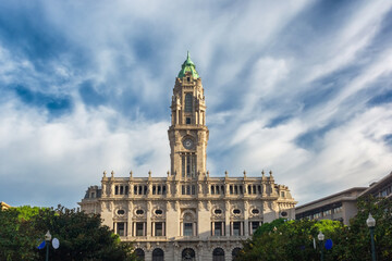 Porto City Hall building in Neoclassical architecture style with clock tower at sunrise, Oporto, Portugal. Popular touristic destination in Europe