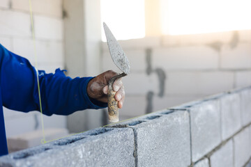 Close up hand construction mason worker bricklayer Engineering people, man construction worker and...