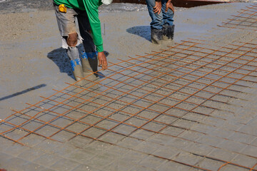 steel rebar framework cement. Engineering people, construction site. construction worker  and...
