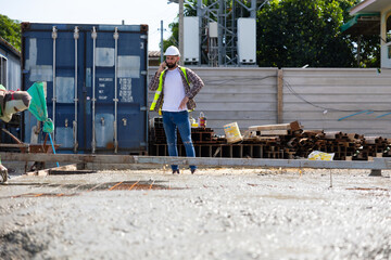wet concret. Engineering people, construction site. construction worker  and architecture pouring...