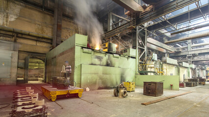 The liquid metal is poured into molds at the metallurgical plant timelapse hyperlapse.