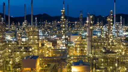 Oil Refinery plant at sunset. Gas Chemical Equipment Prodiction import export Concept, Crude Oil...
