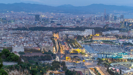 Aerial view over square Portal de la pau day to night timelapse in Barcelona, Catalonia, Spain.