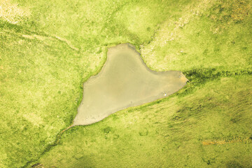 Aerial top down view Nariana lake in Gudamakari. Caucasus mountains alpine lakes in Georgia