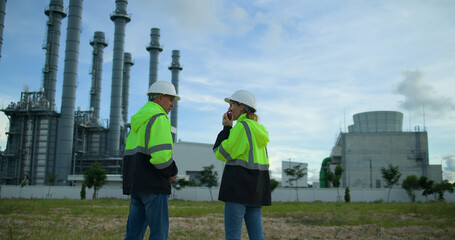 The senior project engineering team Inspects the progress of the building project. Medium-sized power plant in an industrial estate to send payments to companies in industrial zones