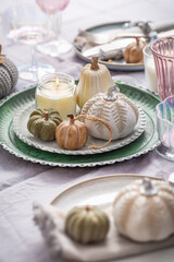 Autumn table setting with pumpkins. Thanksgiving holiday dinner and fall decoration