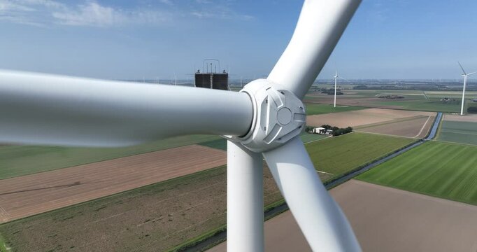 Wint turbine, wind mill, clean green sustainable energy. Generation of electricity by wind power.
