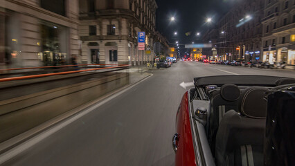 Car moves at fast speed at the night avenue timelapse hyperlapse drivelapse.