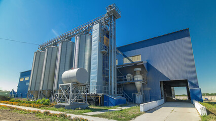 Modern large granary timelapse hyperlapse. Large metal silos.