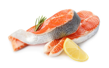 Two fresh salmon steaks, lemon and rosemary isolated on white