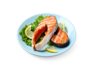 Tasty grilled salmon steaks, lettuce and lemon isolated on white