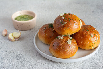 Freshly baked buns (pampushki) with garlic and dill for the first course (soup). National Ukrainian dish, food. Selective focus.