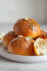 Freshly baked buns (pampushki) with garlic and dill for the first course (soup). National Ukrainian dish, food. Selective focus.