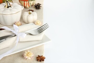 Beautiful table setting with autumnal decor on white background