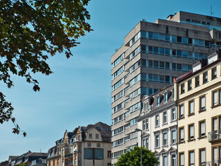 Fototapeta premium large office complex, as it has double the height of neighboring historic buildings and is located right in the middle